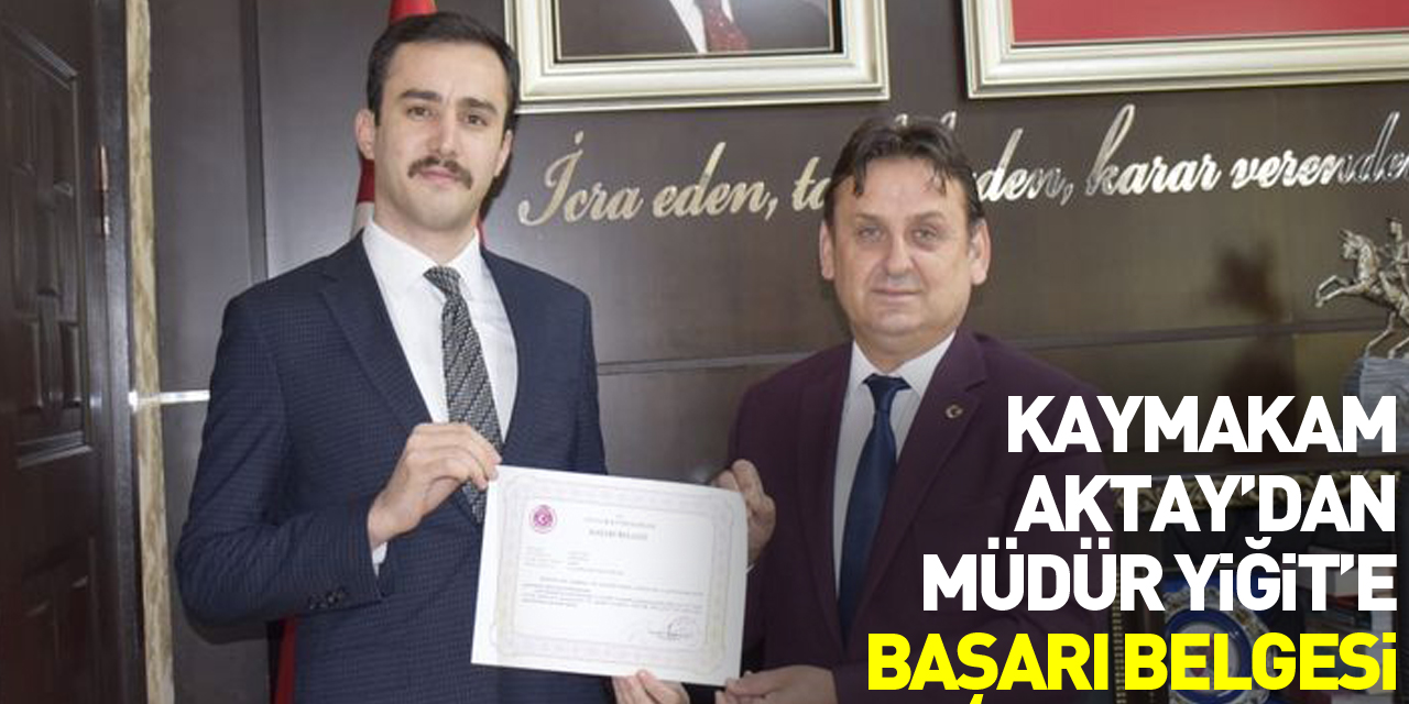 Kaymakam Aktay’dan Müdür Yiğit’e Başarı Belgesi