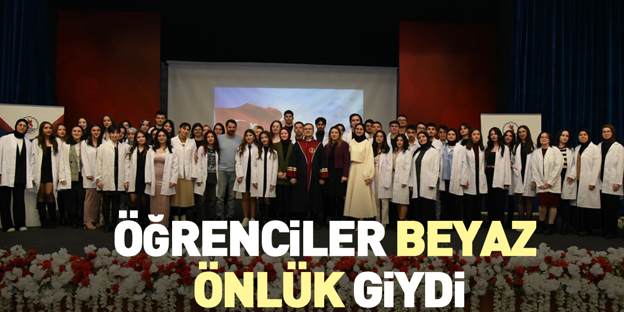 Öğrenciler beyaz önlük giydi