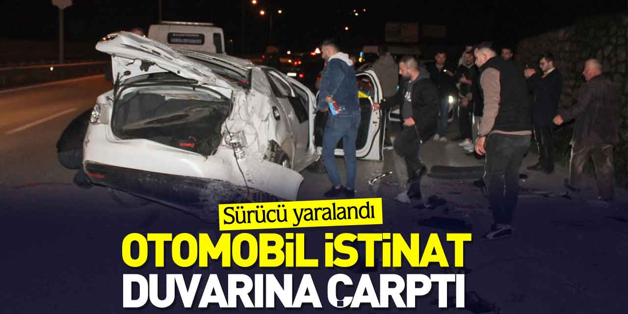 Otomobil istinat duvarına çarptı