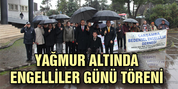 YAĞMUR ALTINDA ENGELLİLER GÜNÜ TÖRENİ