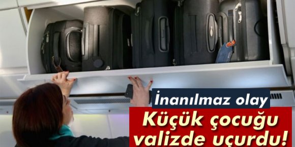 Küçük çocuğu valizde uçurdu