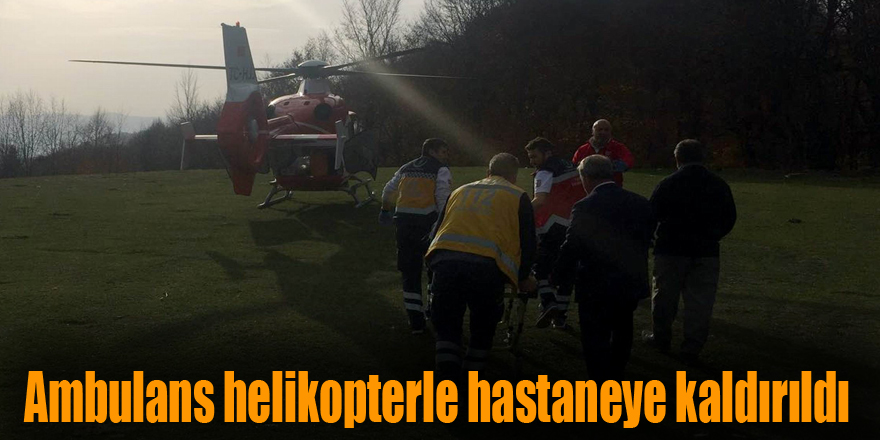 Devrilen traktörün altında kalan şahıs ambulans helikopterle hastaneye kaldırıldı