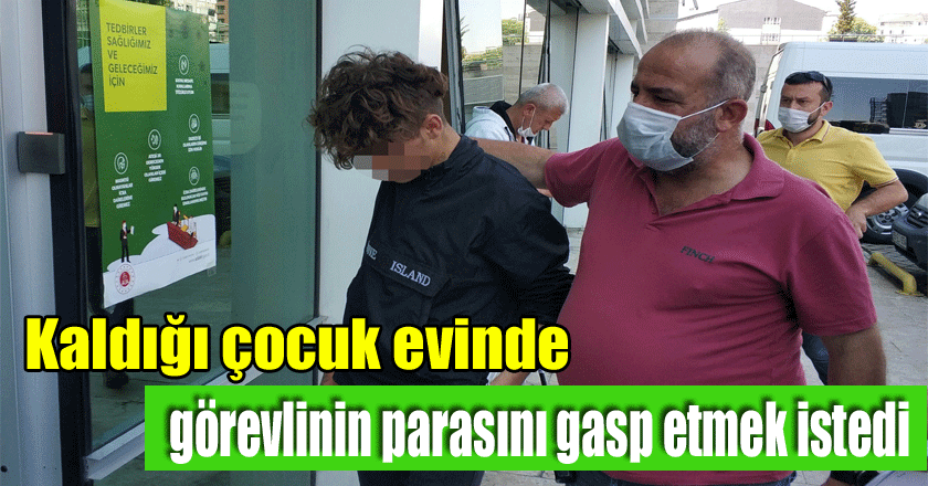 Kaldığı çocuk evinde görevlinin parasını gasp etmek istedi