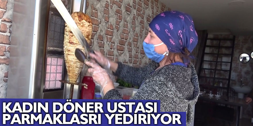 Kadın döner ustası parmakları yediriyor