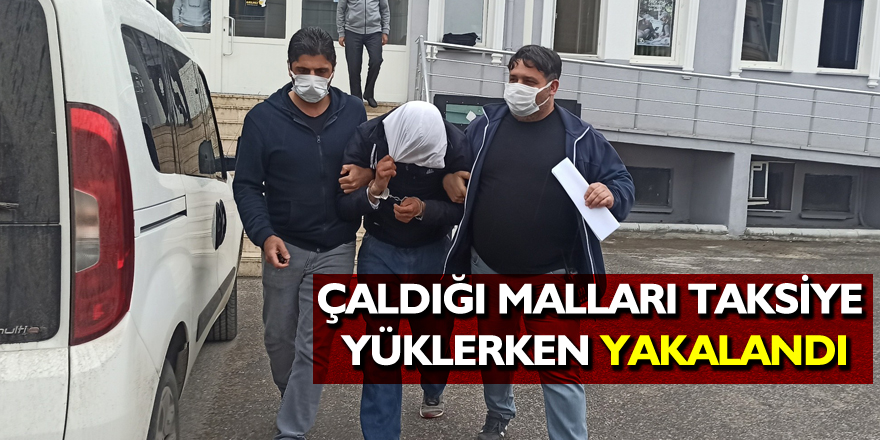 Çaldığı malları taksiye yüklerken yakalandı