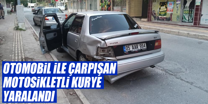 Otomobil ile çarpışan motosikletli kurye yaralandı