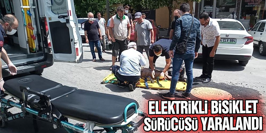 Geri geri gelen otomobile çarpan elektrikli bisiklet sürücüsü yaralandı