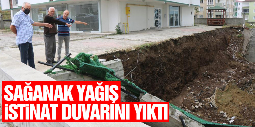 Sağanak yağış 5 katlı apartmanın istinat duvarını yıktı