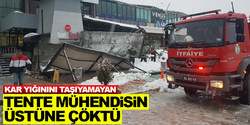 Kar yığınını taşıyamayan tente mühendisin üstüne çöktü