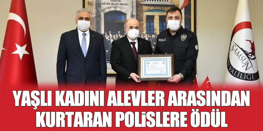 Yaşlı kadını alevler arasından sırtında taşıyarak kurtaran polislere ödül